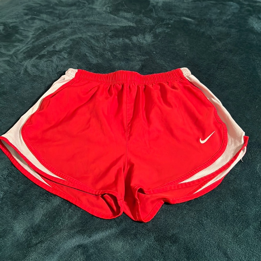 Red Nike shorts